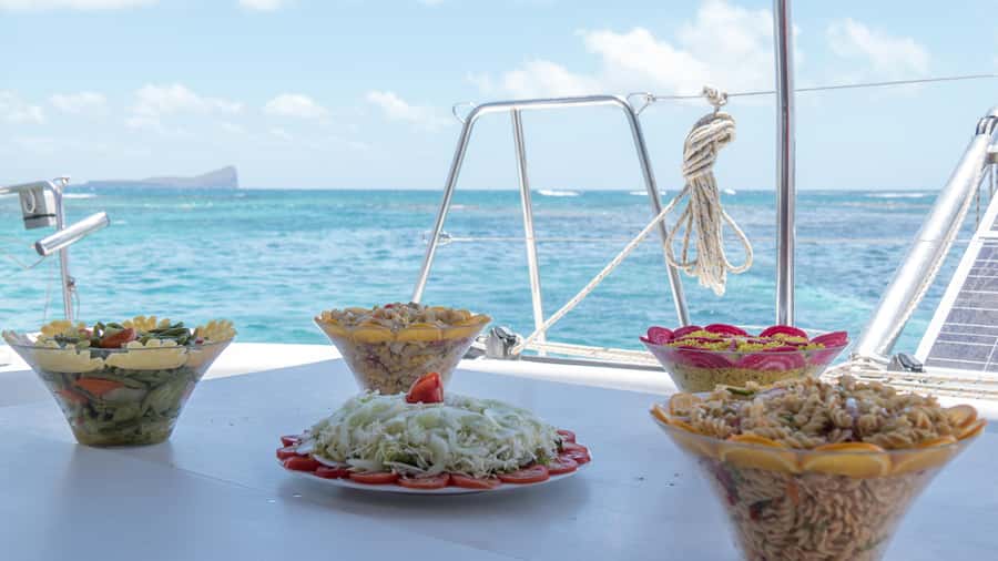 Full Day Catamaran Luxury Cruise to Northern Islands w Lunch - Flat Island brings the first swim