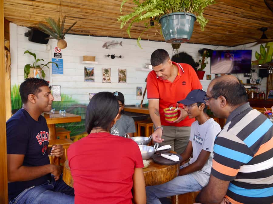 Grand Baie: Coastal Cuisine & Culture Walking Tour - Grand Baie Public Beach and the town between bites