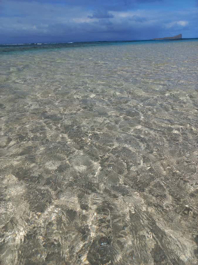Grand Baie: Three Islands Private Boat Trip and Beach BBQ - Gabriel Island and the view toward Coin de Mire