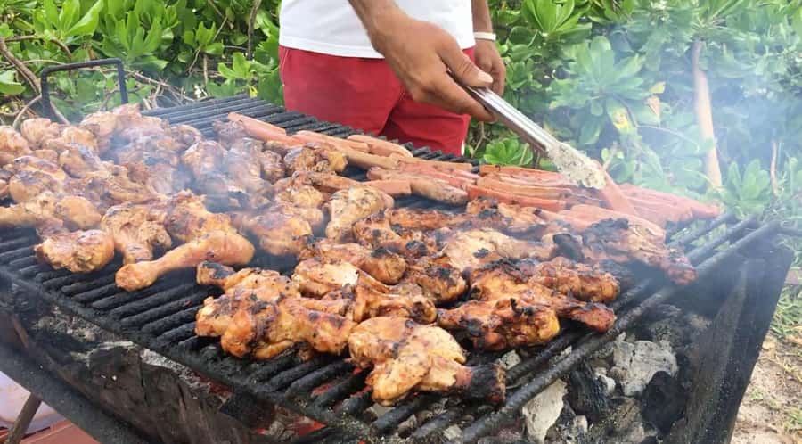 Grand Bay: Catamaran Cruise to Flat Island with BBQ Lunch - What Flat Island offers ashore
