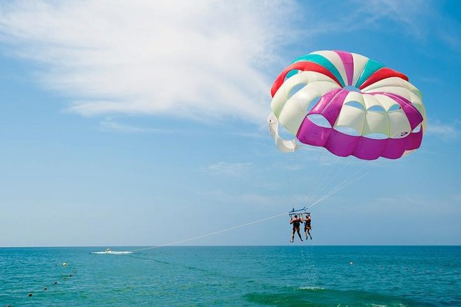 Ile aux Cerf: Speed boat with Parasailing & Tube Riding and Lunch - What the $152.69 price really covers