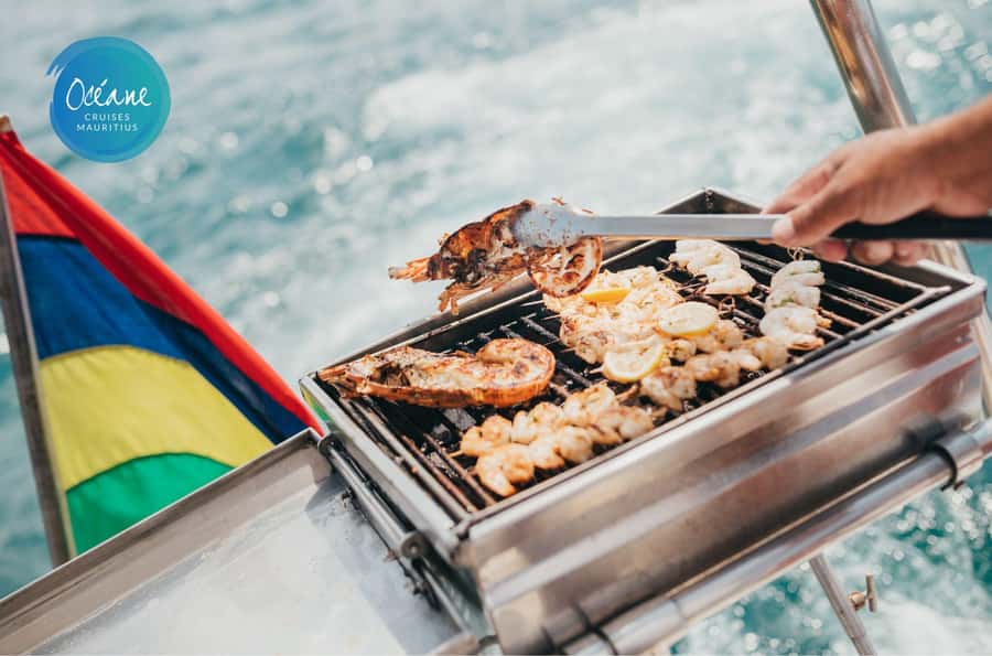 Île aux Cerfs: Private Catamaran Cruise with Gourmet Lunch - Lighthouse views and the first swim