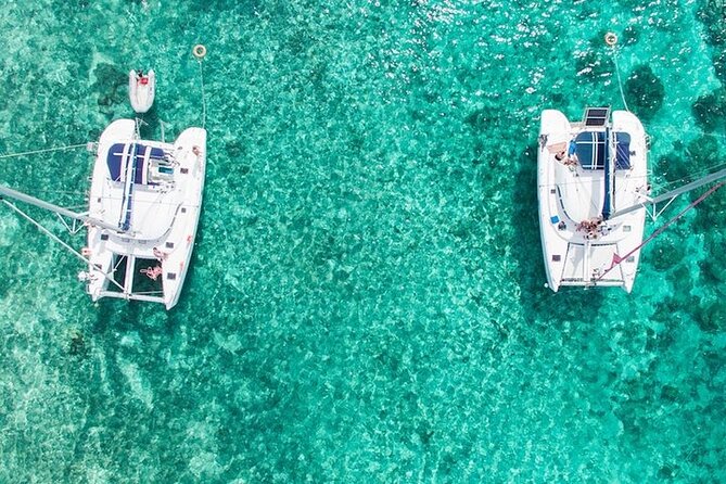 Mauritius: Ile Aux Cerfs Catamaran Tour with Lunch and Drinks - Swimming and snorkeling before lunch