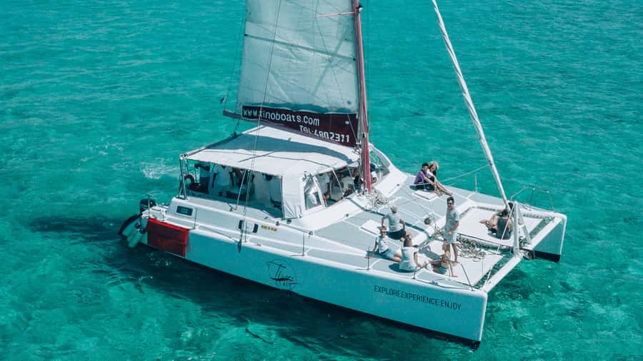 Mauritius: Private Catamaran Tour to île aux Cerfs - Île aux Cerfs, sand, lagoon water, and lunch