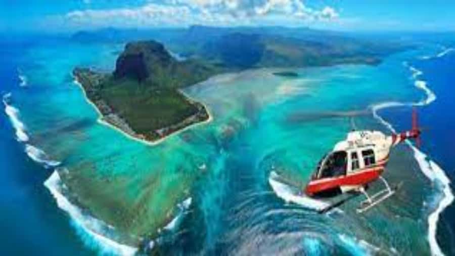 Mauritius: Scenic Helicopter Flight with Hotel Transfers - Hotel pickup with drivers who add context