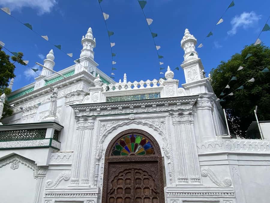 Port Louis: Private Guided Tour and Street Food Tasting - Caudan Waterfront: finish with shops, cafés, and crafts