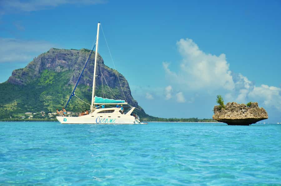 Private Dolphin Swim/Snorkeling & Lunch on Benitiers island - Leaving your accommodation for Tamarin Bay