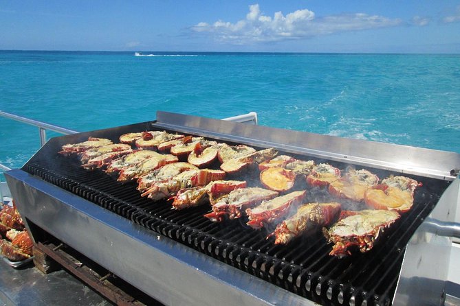 Spectacular Catamaran trip to Ile Aux Cerf with Lunch & Transfer - Three-course lunch with local drinks